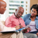 senior couple meeting with a financial advisor