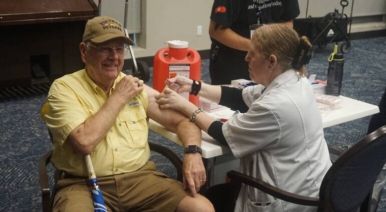 JKV resident at on-site vaccine clinic getting a COVID vaccine